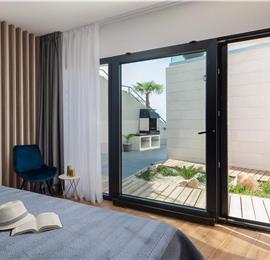 Luxury Beachfront Villa with Heated Infinity Pool near Trogir, Sleeps 8